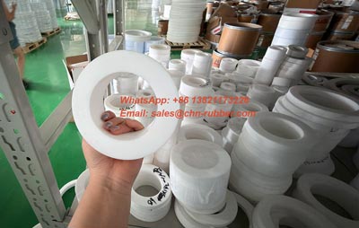 Bulk inventory of industrial PTFE gaskets in warehouse ready for international shipping